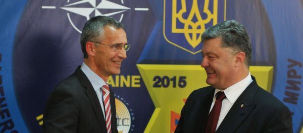 NATO Secretary General Jens Stoltenberg (at the left) and the president of Ukraine Petro Poroshenko at a press conference in the International center of peacemaking and safety on the Yavorivsky ground NATO Secretary General Jens Stoltenberg (at the left) and the president of Ukraine Petro Poroshenko at a press conference in the International center of peacemaking and safety on the Yavorivsky ground - Sputnik International