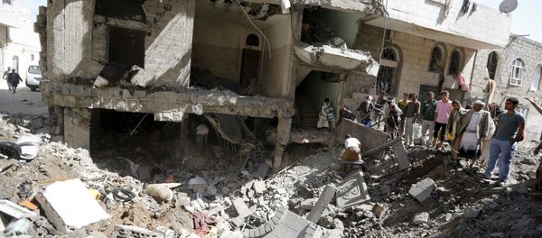 People gather at the site of a Saudi-led air strike in Yemen's capital Sanaa September 22, 2015. Warplanes from a Saudi-led alliance bombed two houses in Yemen's capital on Tuesday, killing at least 20 people, medics and local officials said People gather at the site of a Saudi-led air strike in Yemen's capital Sanaa September 22, 2015. Warplanes from a Saudi-led alliance bombed two houses in Yemen's capital on Tuesday, killing at least 20 people, medics and local officials said - Sputnik International