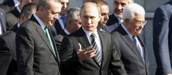 (R-L) Palestinian President Mahmoud Abbas, Russian President Vladimir Putin and Turkish President Tayyip Erdogan walk to attend a ceremony to open the Moscow Grand Mosque in Moscow, Russia, September 23, 2015 (R-L) Palestinian President Mahmoud Abbas, Russian President Vladimir Putin and Turkish President Tayyip Erdogan walk to attend a ceremony to open the Moscow Grand Mosque in Moscow, Russia, September 23, 2015 - Sputnik International