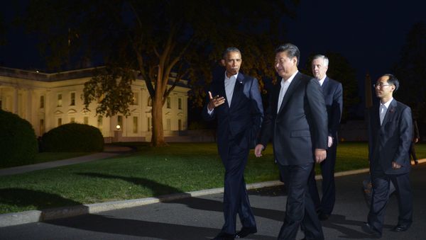 US President Barack Obama and China's President Xi Jinping walk from the White House to a working dinner at Blair House, on September 24, 2015 in Washington, DC. US President Barack Obama and China's President Xi Jinping walk from the White House to a working dinner at Blair House, on September 24, 2015 in Washington, DC. - Sputnik International