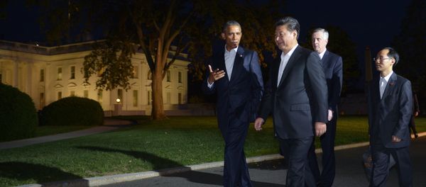 US President Barack Obama and China's President Xi Jinping walk from the White House to a working dinner at Blair House, on September 24, 2015 in Washington, DC. US President Barack Obama and China's President Xi Jinping walk from the White House to a working dinner at Blair House, on September 24, 2015 in Washington, DC. - Sputnik International