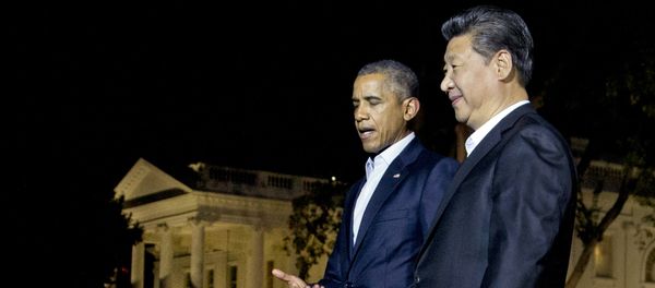 U.S. President Barack Obama and Chinese President Xi Jinping, right, walk on the North Lawn of the White House in Washington - Sputnik International