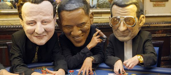 Oxfam international activists pose as British Prime Minister, David Cameron, left, United State President Barak Obama, and French President Nicolas Sarkozy, right. - Sputnik International