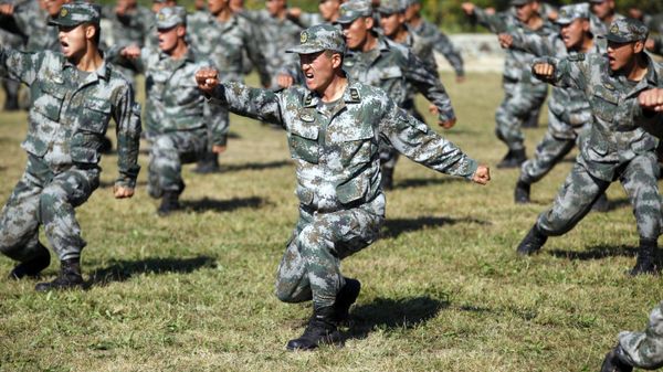 Chinese People's Liberation Army (PLA) soldiers training at their barracks in Heihe, northeast China's Heilongjiang province Chinese People's Liberation Army (PLA) soldiers training at their barracks in Heihe, northeast China's Heilongjiang province - Sputnik International