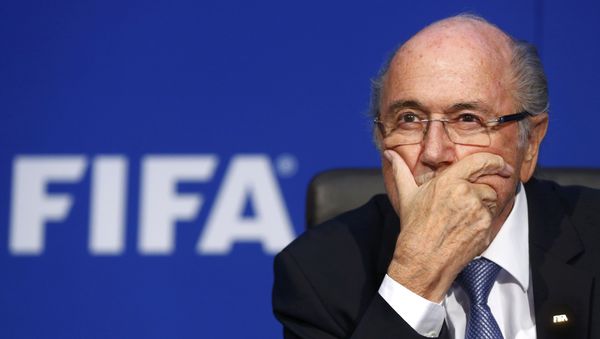 FIFA President Sepp Blatter reacts during a news conference after the Extraordinary FIFA Executive Committee Meeting at the FIFA headquarters in Zurich, Switzerland, in this July 20, 2015 file photo FIFA President Sepp Blatter reacts during a news conference after the Extraordinary FIFA Executive Committee Meeting at the FIFA headquarters in Zurich, Switzerland, in this July 20, 2015 file photo - Sputnik International