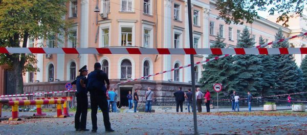 Police experts examine the site of a blast outside the security service (SBU) regional building in central Odessa on September 27, 2015 Police experts examine the site of a blast outside the security service (SBU) regional building in central Odessa on September 27, 2015 - Sputnik International