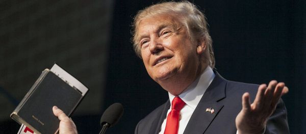 U.S. Republican presidential candidate Donald Trump holds his bible while speaking at the Iowa Faith and Freedom Coalition Forum in Des Moines, Iowa, September 19, 2015 U.S. Republican presidential candidate Donald Trump holds his bible while speaking at the Iowa Faith and Freedom Coalition Forum in Des Moines, Iowa, September 19, 2015 - Sputnik International