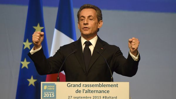 Head of French right-wing party Les Republicains and former President Nicolas Sarkozy delivers a speech during a campaign meeting of the Les Republicains' candidate for the December regional elections in Ile-de-France on September 27, 2015 - Sputnik International
