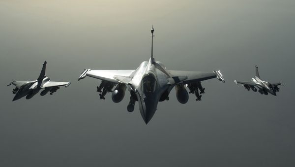 This photo released on Sunday, Sept. 27, 2015 by the French Army Communications Audiovisual office (ECPAD) shows French army Rafale fighter jets flying towards Syria as part of France's Operation Chammal launched in September 2015 in support of the US-led coalition against Islamic State group This photo released on Sunday, Sept. 27, 2015 by the French Army Communications Audiovisual office (ECPAD) shows French army Rafale fighter jets flying towards Syria as part of France's Operation Chammal launched in September 2015 in support of the US-led coalition against Islamic State group - Sputnik International