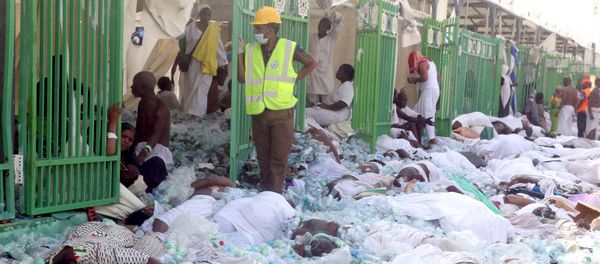 Bodies of Muslim pilgrims are seen after a stampede at Mina, outside the holy Muslim city of Mecca September 24, 2015 - Sputnik International