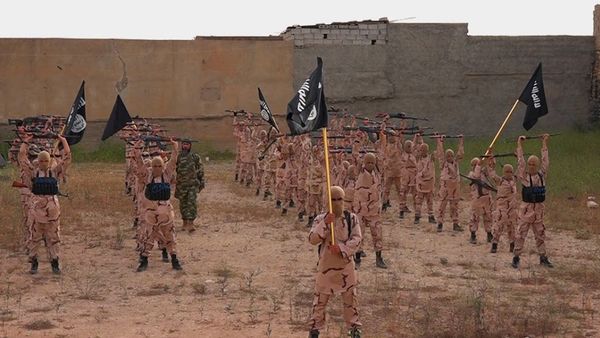 Young boys known as the lion cubs hold rifles and Islamic State group flags as they exercise at a training camp in Tal Afar, near Mosul, northern Iraq (File) Young boys known as the lion cubs hold rifles and Islamic State group flags as they exercise at a training camp in Tal Afar, near Mosul, northern Iraq (File) - Sputnik International