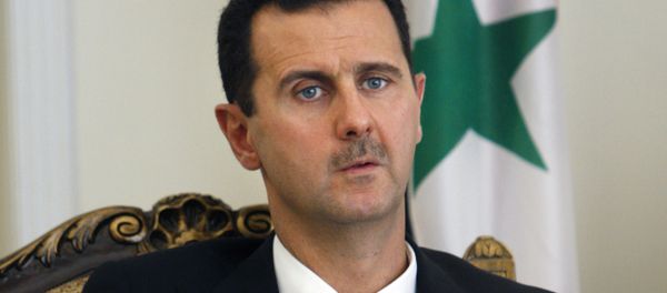 FILE - This Aug. 19, 2009 file photo shows Syrian President Bashar Assad during a meeting with his Iranian counterpart Mahmoud Ahmadinejad in Tehran, Iran FILE - This Aug. 19, 2009 file photo shows Syrian President Bashar Assad during a meeting with his Iranian counterpart Mahmoud Ahmadinejad in Tehran, Iran - Sputnik International