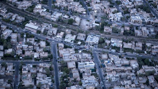 An aerial picture taken on board a helicopter shows a view of the Iraqi capital Baghdad on June 23, 2014 An aerial picture taken on board a helicopter shows a view of the Iraqi capital Baghdad on June 23, 2014 - Sputnik International