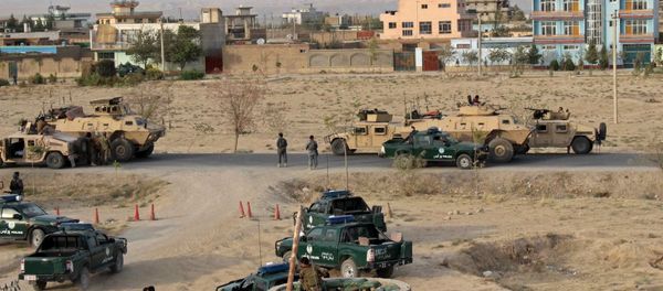 Afghan security forces take their positions during a gun battle in Kunduz city, northern Afghanistan September 29, 2015 Afghan security forces take their positions during a gun battle in Kunduz city, northern Afghanistan September 29, 2015 - Sputnik International