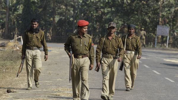 Assam state police personnel patrol - Sputnik International