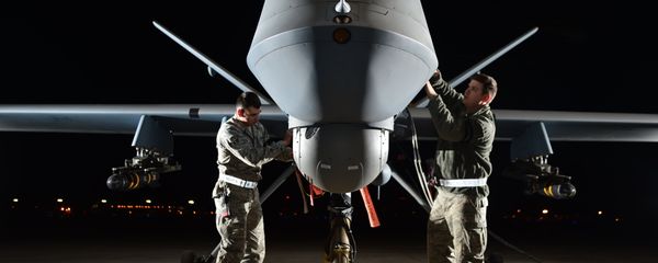 Airman 1st Class Steven (left) and Airman 1st Class Taylor prepare an MQ-9 Reaper for flight during exercise Combat Hammer, May 15, 2014, at Creech Air Force Base, Nev. Reaper crews flew a week-long mission, where they released the GBU-12 Paveway II and AGM-114 Hellfire munitions. Steven and Taylor are MQ-9 Reaper crew chiefs from the 432nd Aircraft Maintenance Squadron. Airman 1st Class Steven (left) and Airman 1st Class Taylor prepare an MQ-9 Reaper for flight during exercise Combat Hammer, May 15, 2014, at Creech Air Force Base, Nev. Reaper crews flew a week-long mission, where they released the GBU-12 Paveway II and AGM-114 Hellfire munitions. Steven and Taylor are MQ-9 Reaper crew chiefs from the 432nd Aircraft Maintenance Squadron. - Sputnik International