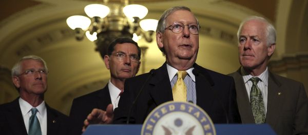 (L-R) Senate Republican leaders Senator Roger Wicker (R-MS), John Barrasso (R-WY), Senate Majority Leader Mitch McConnell (R-KY) and Senate Majority Whip John Cornyn (R-TX) take questions from the media regarding the upcoming budget battle on Capitol Hill in Washington September 29, 2015 - Sputnik International