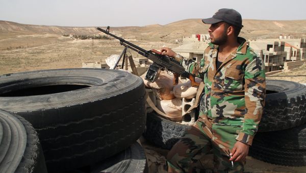 Syrian army soldiers at a checkpoint in the Syrian town of Maaloula, 55 km from Damascus, which was twice captured and looted by Jabhat al-Nusra militants Syrian army soldiers at a checkpoint in the Syrian town of Maaloula, 55 km from Damascus, which was twice captured and looted by Jabhat al-Nusra militants - Sputnik International