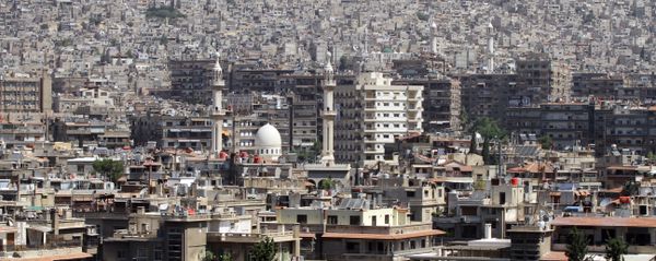 A general view shot taken on June 30, 2015, shows a neighbourhood in the Syrian capital Damascus - Sputnik International