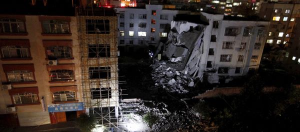 A damaged building is seen after explosions hit Liucheng, Guangxi Zhuang Autonomous Region - Sputnik International