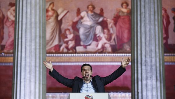 Leader of Syriza left-wing party Alexis Tsipras speaks to his supporters outside Athens University Headquarters, Sunday, Jan. 25, 2015. - Sputnik International