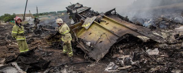Rescuers seen at the site of the MH17 plane crash in Ukraine. File photo Rescuers seen at the site of the MH17 plane crash in Ukraine. File photo - Sputnik International