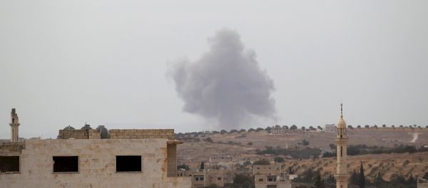 Smoke rises from a base controlled by rebel fighters from the Ahrar al-Sham Movement, that was targeted by what activists said were Russian airstrikes at Hass ancient cemeteries in the southern countryside of Idlib, Syria October 1, 2015. Smoke rises from a base controlled by rebel fighters from the Ahrar al-Sham Movement, that was targeted by what activists said were Russian airstrikes at Hass ancient cemeteries in the southern countryside of Idlib, Syria October 1, 2015. - Sputnik International