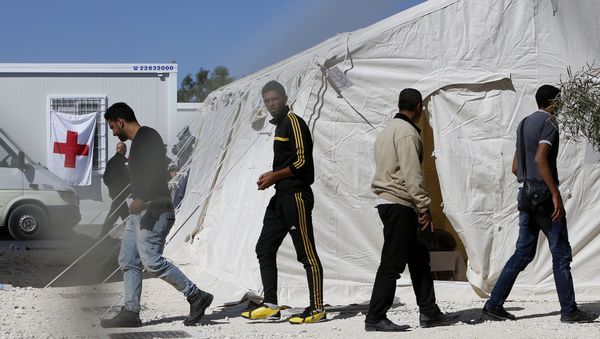 Migrants walk by the tents at a reception camp at Kokkinotrimithia village outside Cyprus' capital Nicosia Migrants walk by the tents at a reception camp at Kokkinotrimithia village outside Cyprus' capital Nicosia - Sputnik International