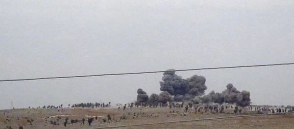 In this image made from video provided by Hadi Al-Abdallah, which has been verified and is consistent with other AP reporting, smoke rises after airstrikes in Kafr Nabel of the Idlib province, western Syria, Thursday, Oct. 1, 2015. In this image made from video provided by Hadi Al-Abdallah, which has been verified and is consistent with other AP reporting, smoke rises after airstrikes in Kafr Nabel of the Idlib province, western Syria, Thursday, Oct. 1, 2015. - Sputnik International