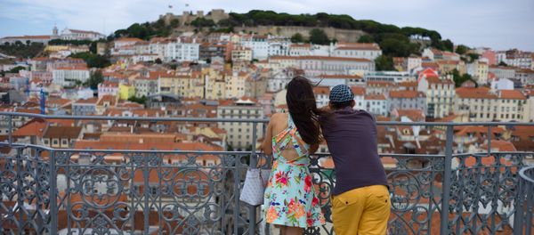 A young couple enjoys the view from the top of Lisbon's 1902 Santa Justa lift Friday. A young couple enjoys the view from the top of Lisbon's 1902 Santa Justa lift Friday. - Sputnik International