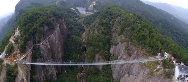 China: Drone captures world's longest GLASS suspension bridge China: Drone captures world's longest GLASS suspension bridge - Sputnik International