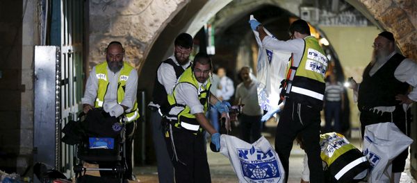 Members of the Zaka Rescue and Recovery team clean the scene where a Palestinian was shot dead after he stabbed and killed two people in Jerusalem's Old City October 3, 2015 Members of the Zaka Rescue and Recovery team clean the scene where a Palestinian was shot dead after he stabbed and killed two people in Jerusalem's Old City October 3, 2015 - Sputnik International