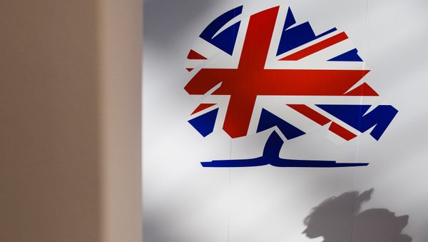 The Conservative party logo is displayed on the first day of the annual Conservative party conference in Manchester, north west England, on October 4, 2015.  - Sputnik International
