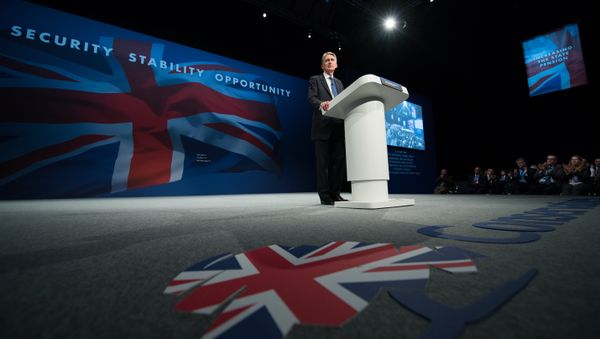 British Foreign Secretary Philip Hammond addresses delegates on the first day of the annual Conservative party conference in Manchester, north west England, on October 4, 2015. British Foreign Secretary Philip Hammond addresses delegates on the first day of the annual Conservative party conference in Manchester, north west England, on October 4, 2015. - Sputnik International