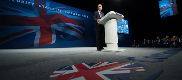 British Foreign Secretary Philip Hammond addresses delegates on the first day of the annual Conservative party conference in Manchester, north west England, on October 4, 2015. - Sputnik International