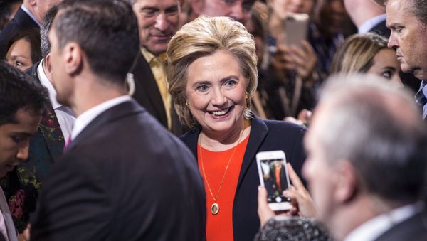 Democratic presidential candidate Hillary Clinton has a picture taken by a supporter after speaking at the Human Rights Campaign Breakfast in Washington, October 3, 2015 Democratic presidential candidate Hillary Clinton has a picture taken by a supporter after speaking at the Human Rights Campaign Breakfast in Washington, October 3, 2015 - Sputnik International