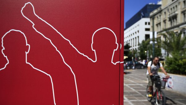 A man cycles past a banner of the radical left Syriza party, in central Athens, Wednesday, Sept. 16, 2015. Greece is holding a snap general election on Sept. 20, 2015. A man cycles past a banner of the radical left Syriza party, in central Athens, Wednesday, Sept. 16, 2015. Greece is holding a snap general election on Sept. 20, 2015. - Sputnik International