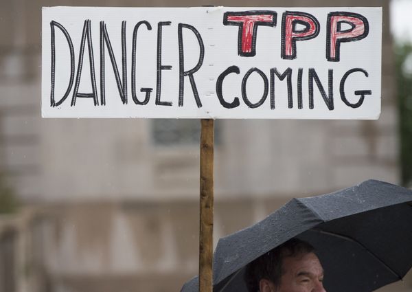 Demonstrators protest against the legislation to give US President Barack Obama fast-track authority to advance trade deals, including the Trans-Pacific Partnership (TPP), during a protest march on Capitol Hill in Washington, DC, May 21, 2015. - Sputnik International