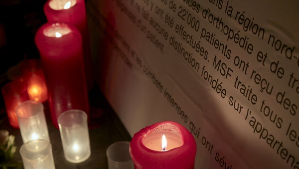 Candles are pictured outside the Medecins Sans Frontieres (MSF) headquarters in Geneva, Switzerland October 7, 2015 Candles are pictured outside the Medecins Sans Frontieres (MSF) headquarters in Geneva, Switzerland October 7, 2015 - Sputnik International