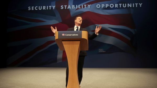 Britain's Prime Minister David Cameron gestures as he delivers his keynote address at the annual Conservative Party Conference in Manchester, Britain October 7, 2015 Britain's Prime Minister David Cameron gestures as he delivers his keynote address at the annual Conservative Party Conference in Manchester, Britain October 7, 2015 - Sputnik International