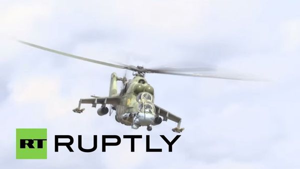 Mil Mi-24 attack helicopters guard Russia's main Syrian Air Base - Sputnik International