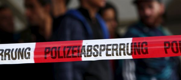 Migrants wait at a meadow near Breitenberg, south eastern Germany, October 5, 2015, before the German police will bring them to a first registration point in Passau. Migrants wait at a meadow near Breitenberg, south eastern Germany, October 5, 2015, before the German police will bring them to a first registration point in Passau. - Sputnik International
