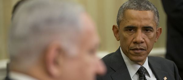 President Barack Obama listens as Israeli Prime Minister Benjamin Netanyahu speaks during their meeting in the Oval Office of the White House in Washington, Wednesday, Oct. 1, 2014. President Barack Obama and Israeli Prime Minister Benjamin Netanyahu met for the first time since a rash of civilian casualties during Israel's summer war with Hamas heightened tensions between two leaders who have long had a prickly relationship. President Barack Obama listens as Israeli Prime Minister Benjamin Netanyahu speaks during their meeting in the Oval Office of the White House in Washington, Wednesday, Oct. 1, 2014. President Barack Obama and Israeli Prime Minister Benjamin Netanyahu met for the first time since a rash of civilian casualties during Israel's summer war with Hamas heightened tensions between two leaders who have long had a prickly relationship. - Sputnik International