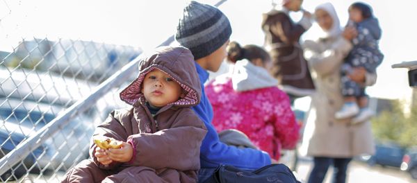 Passengers among them migrants and refugees, exit the German ferry terminal in Goteborg, Sweden, September 11, 2015 - Sputnik International