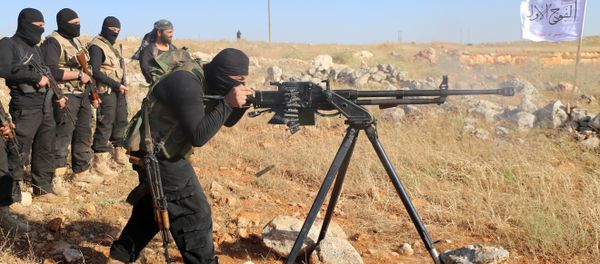 Rebel fighters from the First Battalion under the Free Syrian Army take part in a military training on June 10, 2015, in the rebel-held countryside of the northern city of Aleppo Rebel fighters from the First Battalion under the Free Syrian Army take part in a military training on June 10, 2015, in the rebel-held countryside of the northern city of Aleppo - Sputnik International