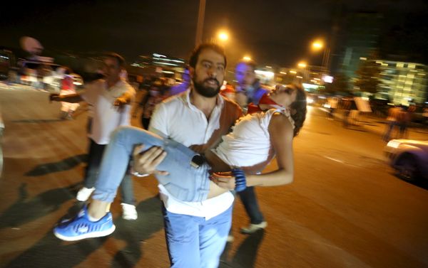 A man carries a protester affected by tear gas released by security forces in Martyr square, downtown Beirut, Lebanon October 8, 2015. Lebanese security forces fired tear gas and water cannons to break up an anti-government protest in Beirut on Thursday, and the country's fractious leaders postponed talks aimed at resolving a political crisis that is feeding public discontent. A man carries a protester affected by tear gas released by security forces in Martyr square, downtown Beirut, Lebanon October 8, 2015. Lebanese security forces fired tear gas and water cannons to break up an anti-government protest in Beirut on Thursday, and the country's fractious leaders postponed talks aimed at resolving a political crisis that is feeding public discontent. - Sputnik International