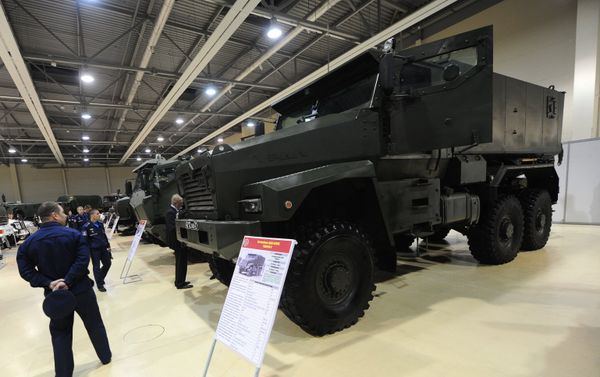 Visitors at a Ural-63095 Typhoon-U armored vehicle at the exhibition Innovations Day of the Southern Military District in Rostov-on-Don. Visitors at a Ural-63095 Typhoon-U armored vehicle at the exhibition Innovations Day of the Southern Military District in Rostov-on-Don. - Sputnik International