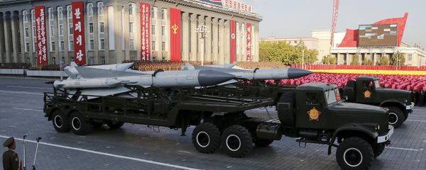 Missiles are taken on trucks past a stand with North Korean leader Kim Jong Un during the parade celebrating the 70th anniversary of the founding of the ruling Workers' Party of Korea, in Pyongyang October 10, 2015 Missiles are taken on trucks past a stand with North Korean leader Kim Jong Un during the parade celebrating the 70th anniversary of the founding of the ruling Workers' Party of Korea, in Pyongyang October 10, 2015 - Sputnik International