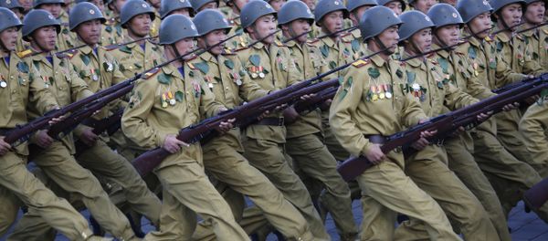 North Korean soldiers parade on Kim Il Sung Square, Saturday, Oct. 10, 2015, in Pyongyang, North Korea North Korean soldiers parade on Kim Il Sung Square, Saturday, Oct. 10, 2015, in Pyongyang, North Korea - Sputnik International