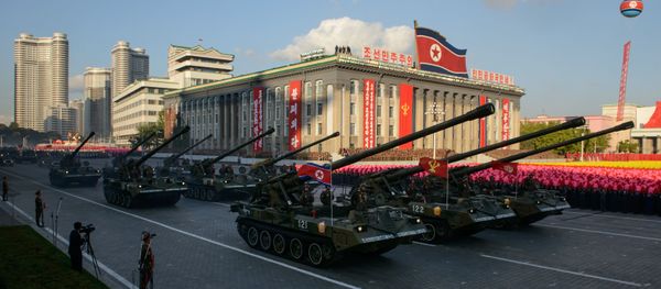 North Korean tanks pass through Kim Il-Sung square during a mass military parade in Pyongyang on October 10, 2015 North Korean tanks pass through Kim Il-Sung square during a mass military parade in Pyongyang on October 10, 2015 - Sputnik International